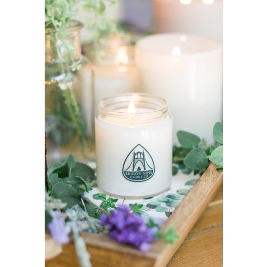 Small glowing  lavender candle